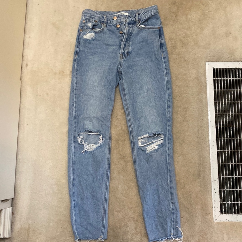 High waisted girls ripped jeans- perfect shape. Only worn a few times